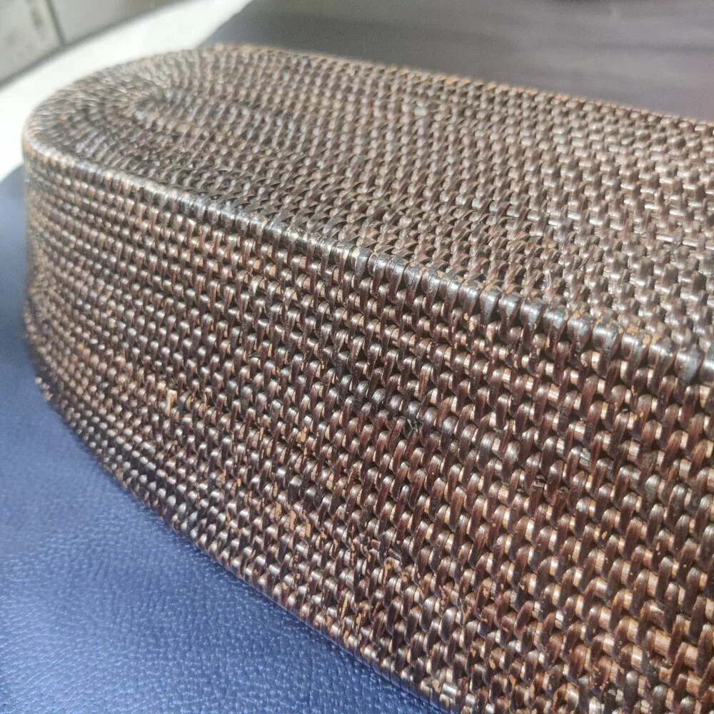 Woven bread basket is long and rectangular oval shape. The weave is exceptional